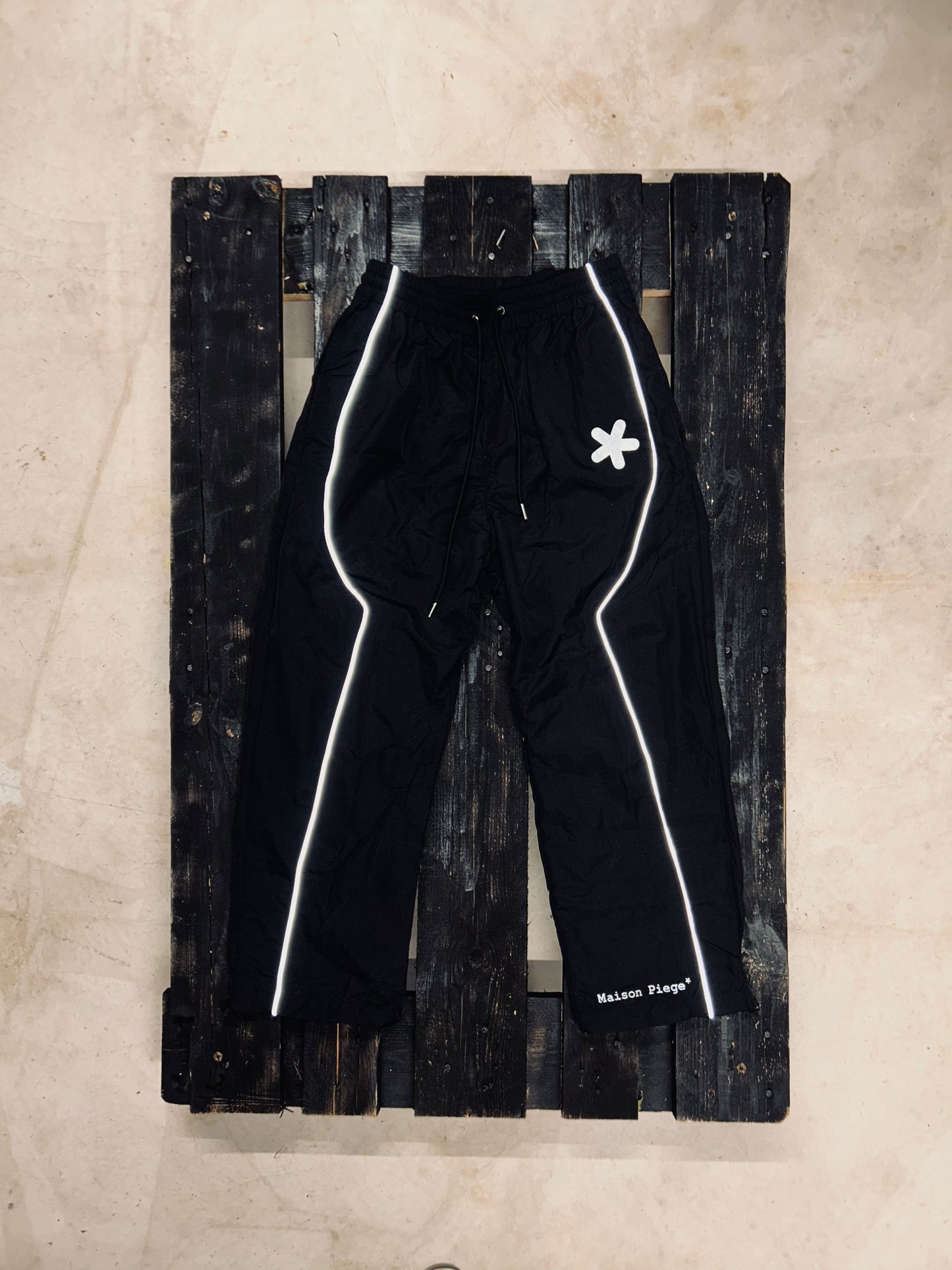 A00* AS'TERISQUE TRACK PANTS REFLECTIVE